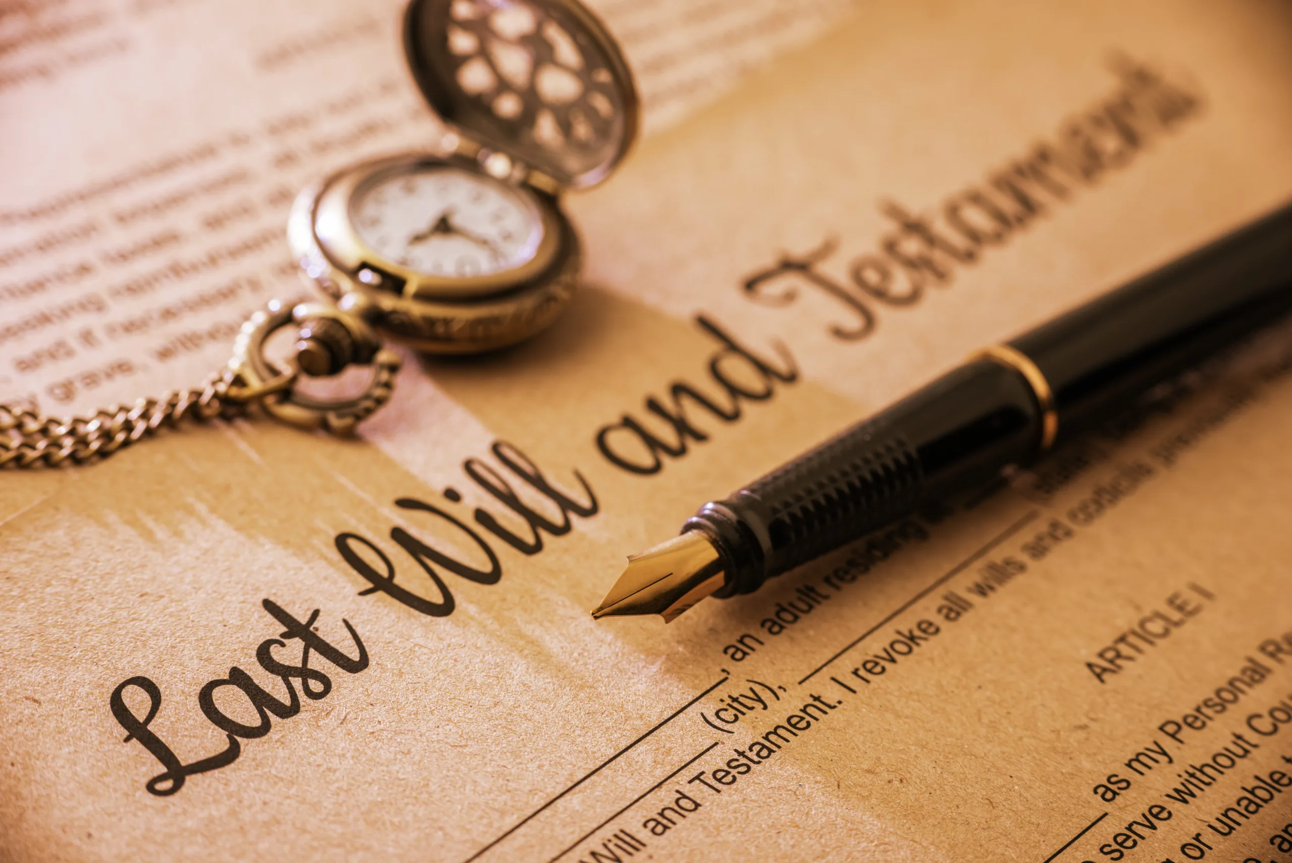 a pen and watch on a document